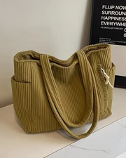 Marta™ | Bolso de mano acanalado con detalle de cordón