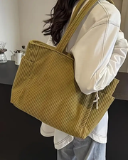 Marta™ | Bolso de mano acanalado con detalle de cordón