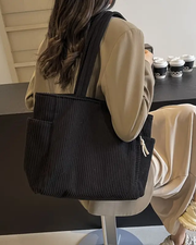 Marta™ | Bolso de mano acanalado con detalle de cordón